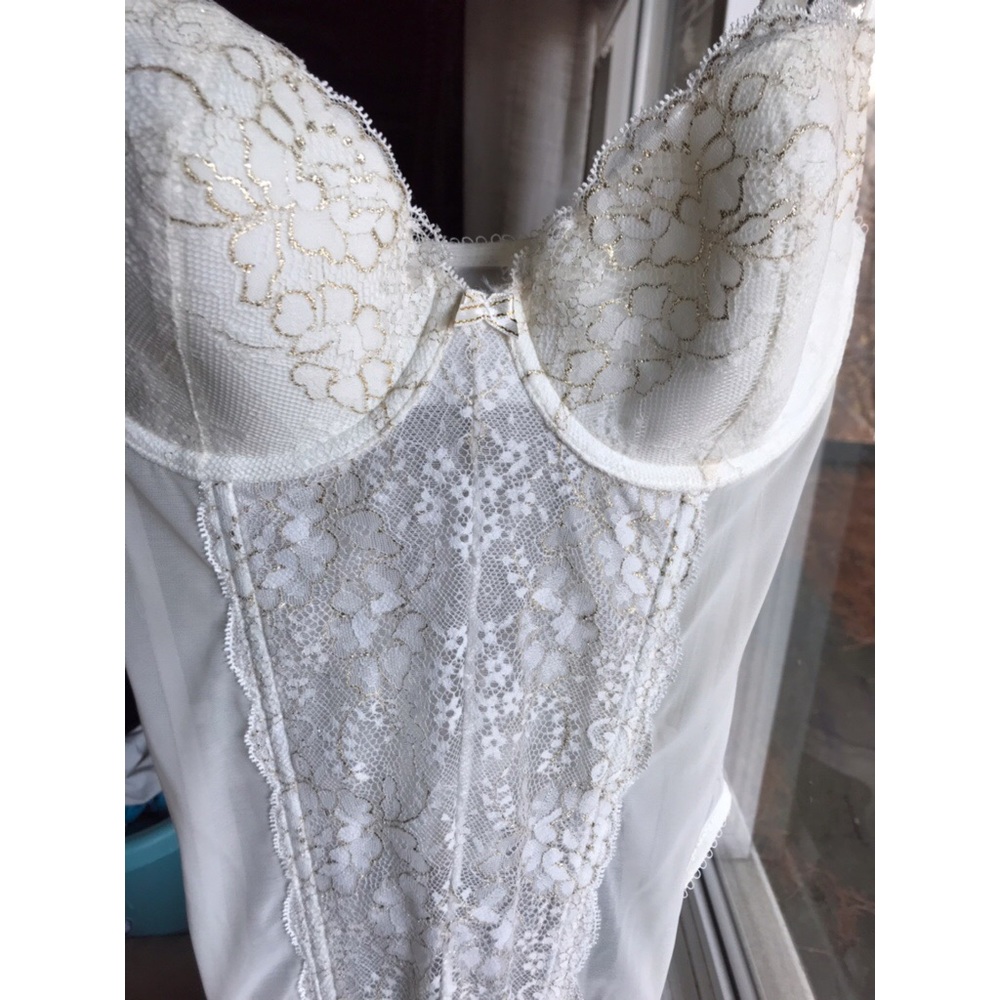 Victoria’s Secret lacy corset with gold trimmings